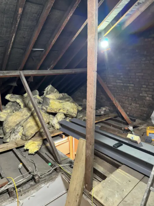 Foam stripped back and roof timbers exposed, Carter Langfold
